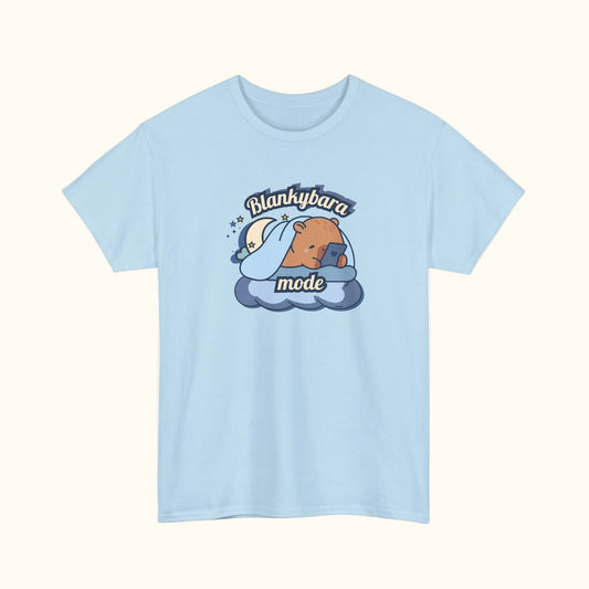 Light blue t-shirt with cartoon capybara design and text on a white background